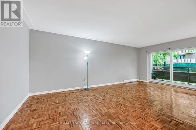 Building Photo - 11 Woodman Dr S