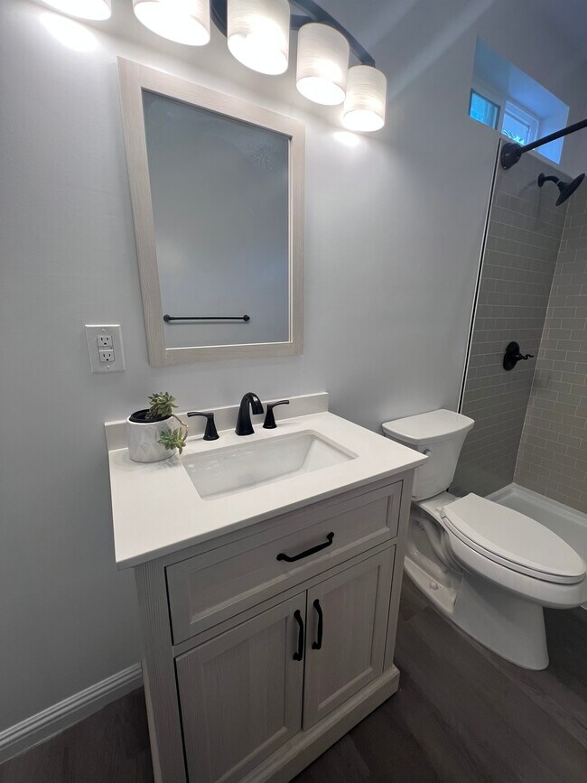 Brand new BR, abundant lighting, with blue tooth vent. - 9300 Benson Way