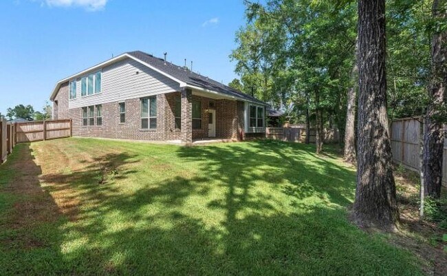 Foto del edificio - 104 Windflower Track Ct