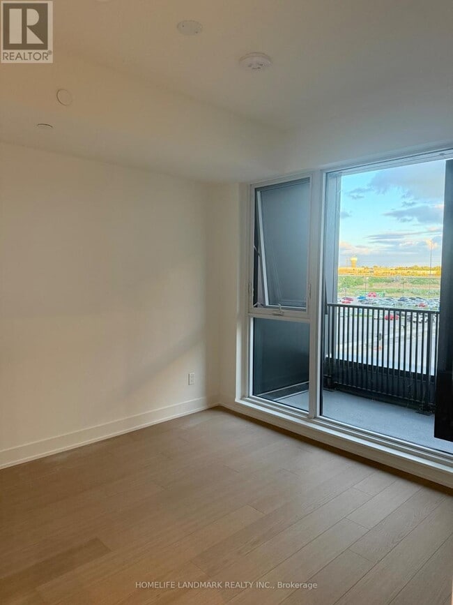 Building Photo - 38-D438 Andre de Grasse St