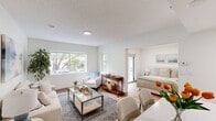 Located at 25 Connector Rd, Unit 313 in Westborough, MA, this single-floor, 2-bedroom, 1-bathroom unit offers a well-organized and efficient layout. The living room serves as the heart of the space, featuring light wood flooring, neutral-toned walls, and large windows that frame tree-lined outdoor views, filling the room with natural light. The open, airy atmosphere makes the living area feel welcoming and functional.

The primary bedroom is a cozy retreat complete with a sliding glass door that opens to a private balcony, offering additional natural light and outdoor access. A mirrored sliding closet adds depth and practicality to the room, while light wood flooring continues the cohesive aesthetic throughout. The second bedroom maintains the same clean, bright character.

The bathroom is finished with neutral tile work, featuring a full soaking tub with an overhead shower, a curved shower rod, and a clean, understated design that complements the overall tone of the unit.

Throughout the space, the consistent use of light wood flooring, white walls, and textured ceilings contributes to a bright and cohesive environment. The unit's layout efficiently utilizes every area, making it a practical and comfortable residence in Westborough, MA.