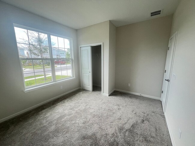 Building Photo - Welcome to this BRAND NEW 4-bedroom, 2-bathroom home located in the community of Canopy Terrace