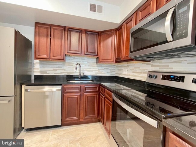 Building Photo - 4523 Logsdon Dr