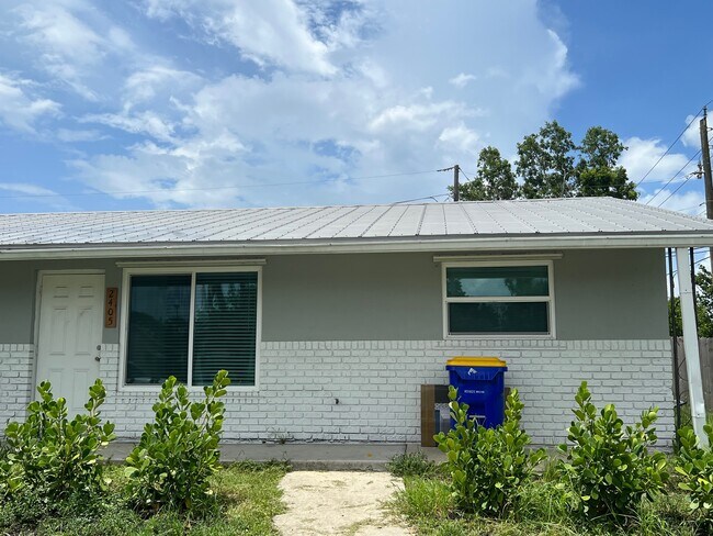 Street view of duplex - 2405 NE Rustic Plz