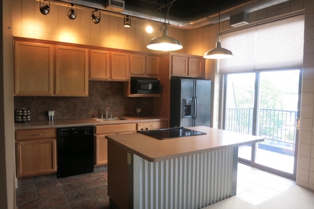 kitchen and balcony - 801 Monroe Ave NW