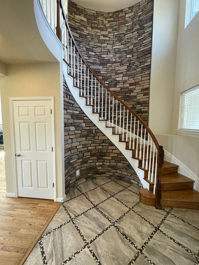 Building Photo - Sprawling Two-Story Home w/ Yard Maintenan...