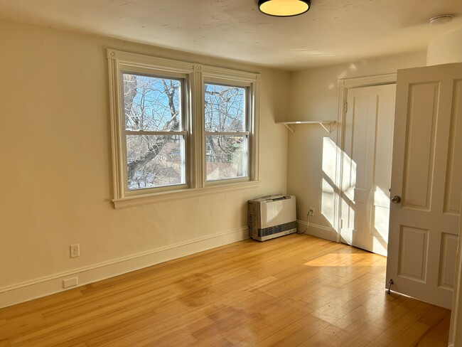 bedroom with closet & Rinnai heat - 112 Harriet St