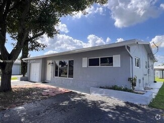 Building Photo - 9021 NW 24th Pl