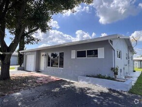 Building Photo - 9021 NW 24th Pl