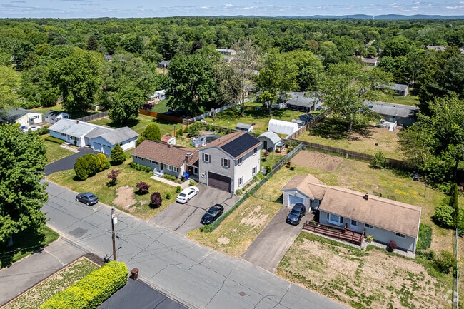 Many of Enfield's homes started out small but have been expanded with garages and additions.