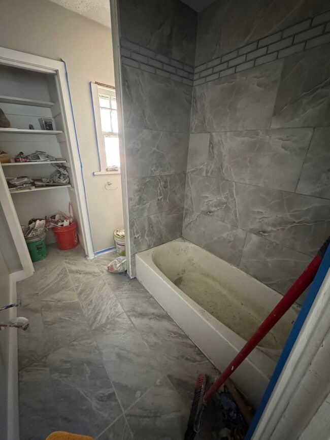 Medium sized bathroom, newly tiled, shelve space - 125 Blymyer Ave