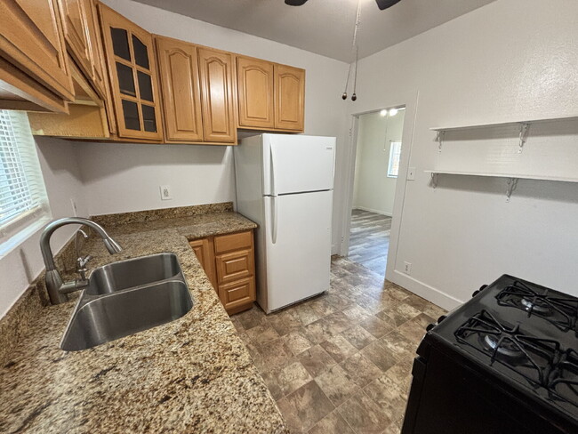 Building Photo - "Charming 1-Bedroom Sanctuary with Granite...