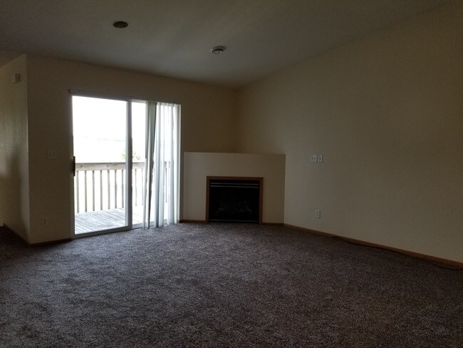 Living Rm with Private Balcony - 1728 Birchwood St