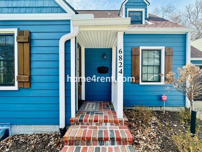 Foto del edificio - Charming, Prairie Village Home in a Quiet Neighborhood with Wood Floors and a Fenced Yard!