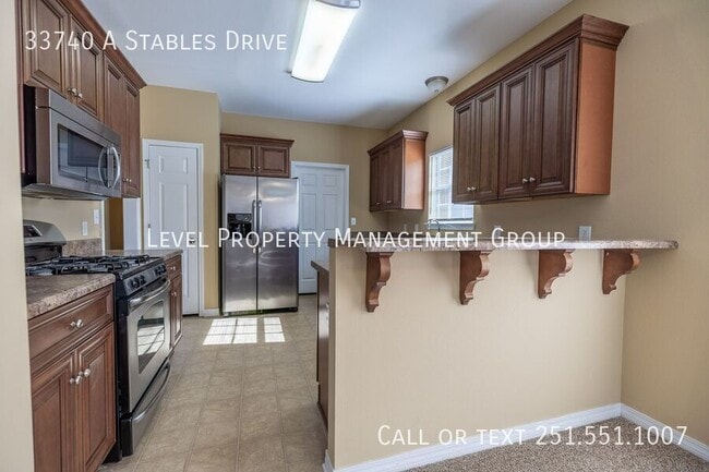 Building Photo - 33740 Stables Dr E