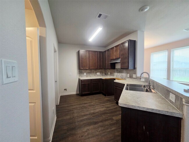 Foto del edificio - 7459 Wheatley Gardens Dr
