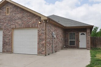 Building Photo - 7600-7602 Novella Dr