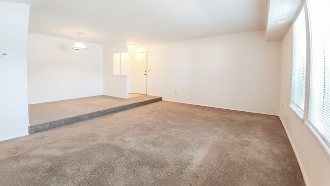 Garden level living room/ dining room - Windsor Gardens Apartments