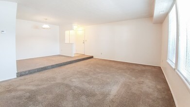 Garden level living room/ dining room - Windsor Gardens Apartments