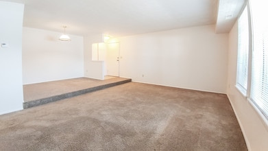Garden level living room/ dining room - Windsor Gardens Apartments