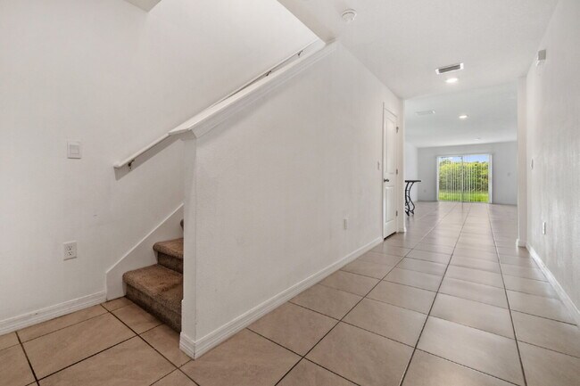 Building Photo - "Spacious 5-Bedroom Haven with Stunning Lake Views & Granite Elegance in Riverview!"