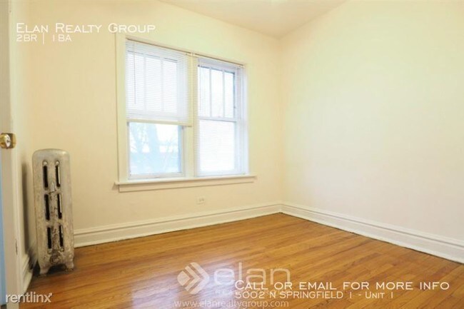 Building Photo - 5002 N SPRINGFIELD 1
