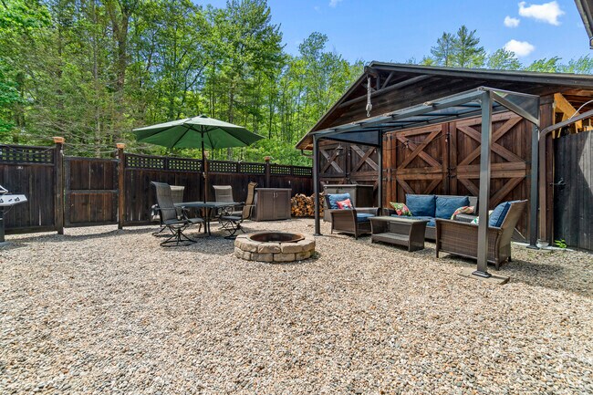 Fully fenced in private patio with gated entrance. - 595 Emerys Bridge Rd