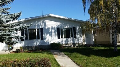 Building Photo - 4403-4455 55 Ave