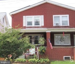 Building Photo - 209 W 7th Ave