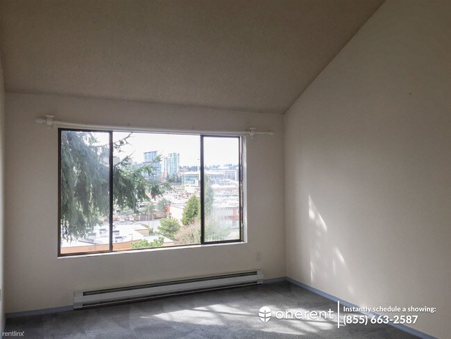 Building Photo - 2 br, 2 bath Condo - 711 122nd Ave NE #A5