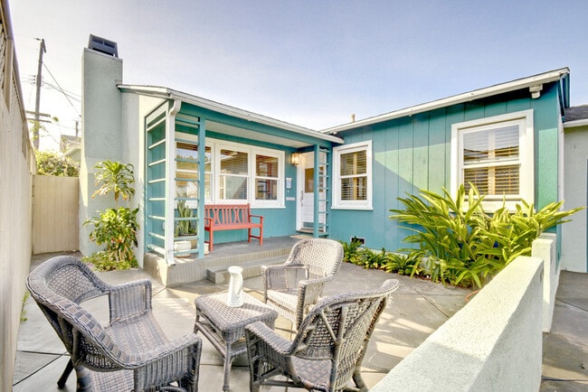 Enclosed outdoor patio area off of front porch (furniture not included) - 5536 W 134th Pl