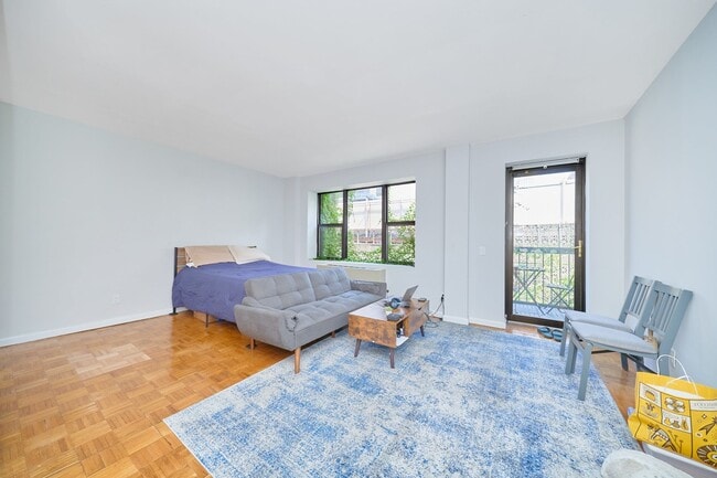 Building Photo - JUST LISTED HUGE STUDIO W/ PRIVATE BALCONY IN HELL’S KITCHEN