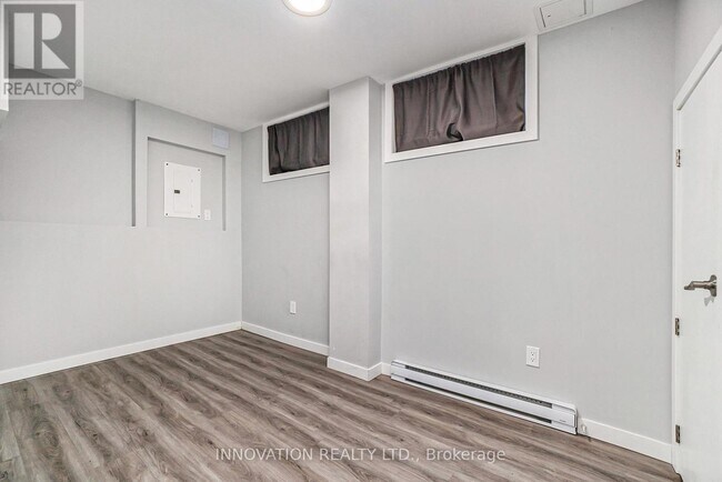 Photo du bâtiment - 1675 Baseline Rd