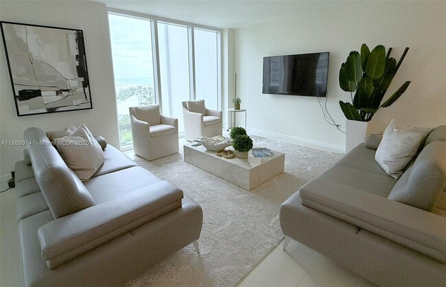 Building Photo - 10275 Collins Ave