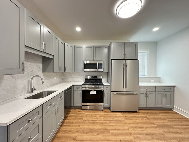 Foto del edificio - 3713 W Belmont Ave