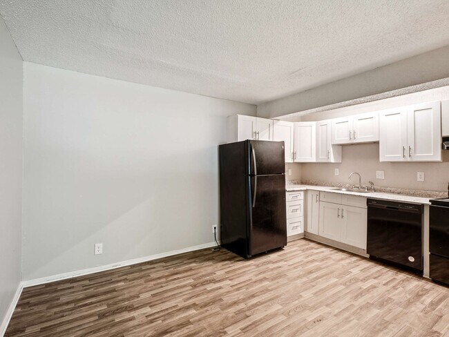 Área de comedor - Village Walk Apartments