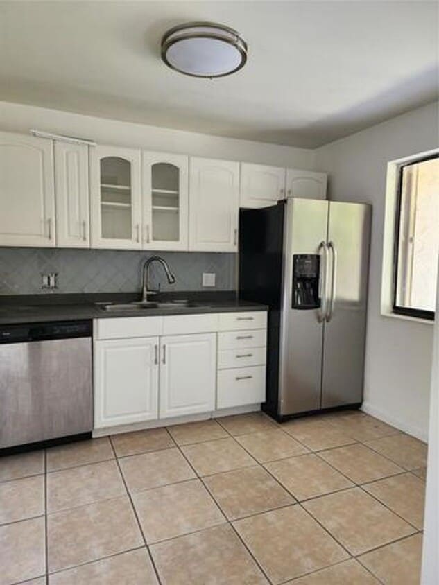 Photo - 390 Racquet Club Road 204, Weston, FL 33326