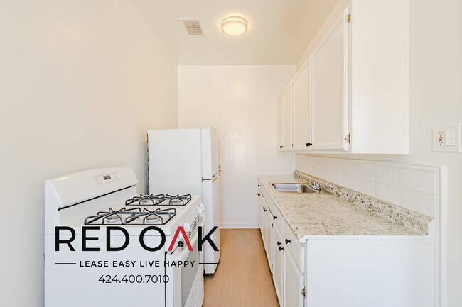 Building Photo - 840 S Hobart Blvd