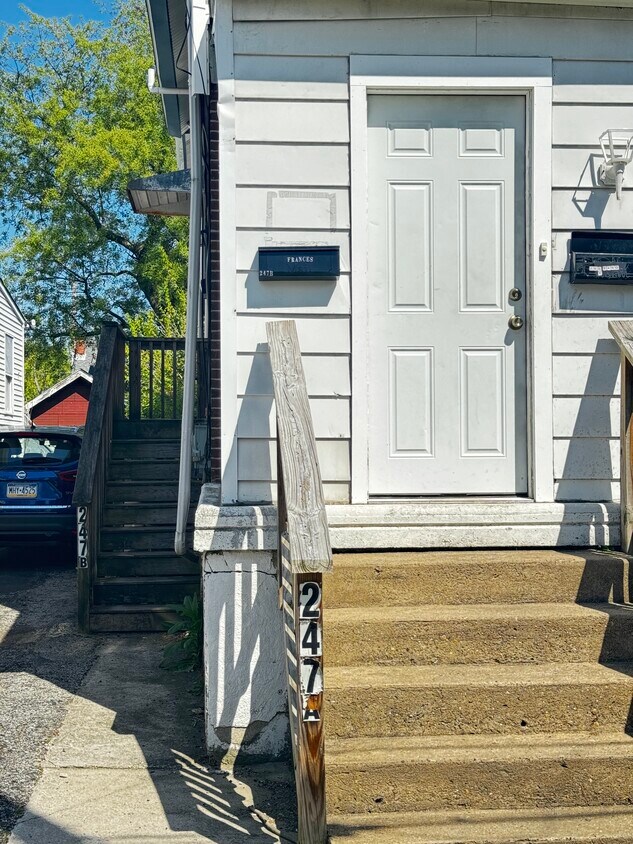 Unit entrance at the stairs on the left of the house - 247 Melrose Ave