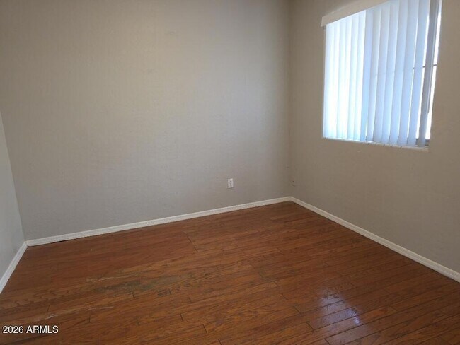 Building Photo - 10783 W Edgemont Ave