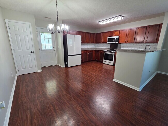 Building Photo - 208 Maypop Dr
