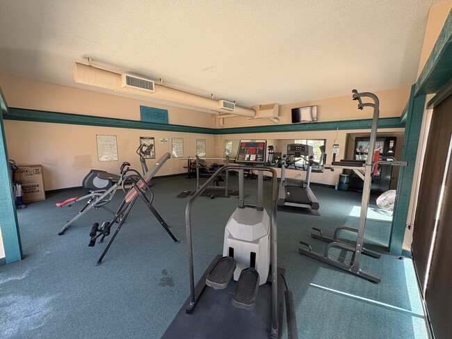Gimnasio - Sandpointe Apartment Homes