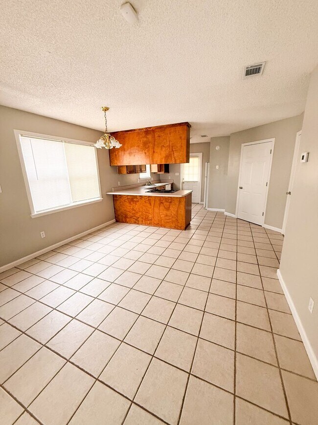 Foto del edificio - 3944 Heatherwoods Dr