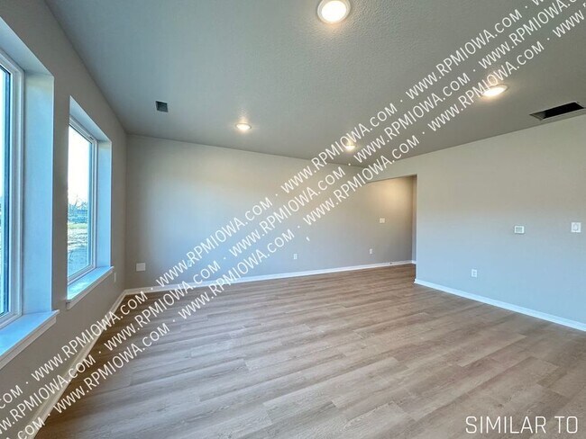Building Photo - BRAND NEW, BEAUTIFUL FINISHES!- 3 Bedroom ...