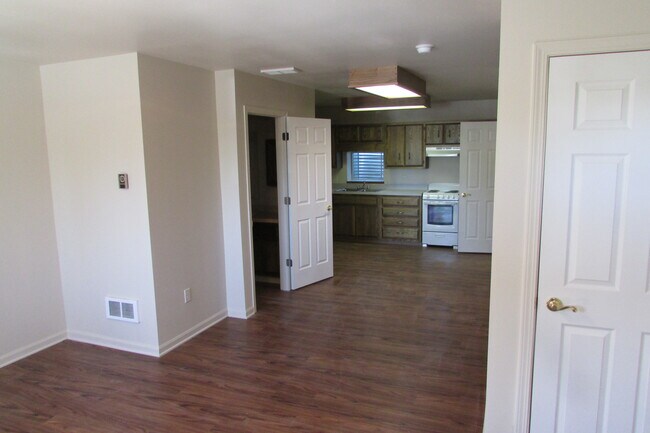 Open floor plan--LVR to kitchen - 2234 Lamplighter Ln