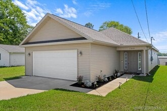 Building Photo - 102C Whispering Pines St