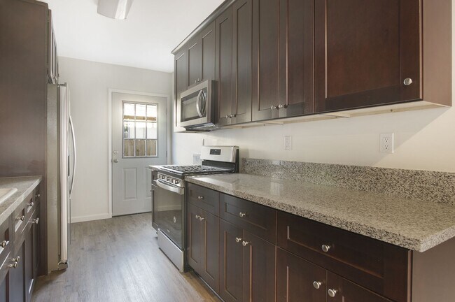 remodeled kitchen with stainless steel appliances - 4091 Rosecrans Ave