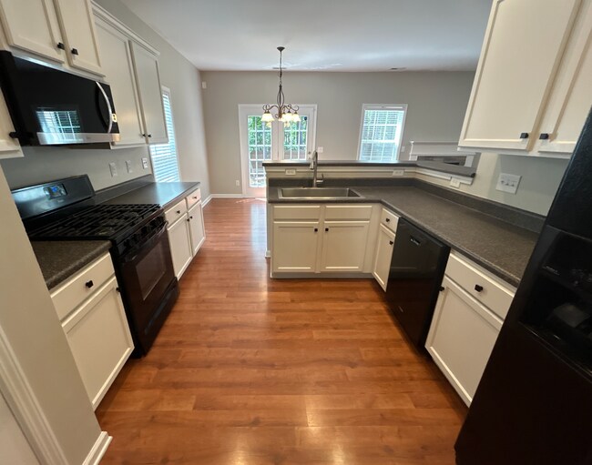 Building Photo - 4 Bedroom | 3 Bathroom Apex Home with Fenc...