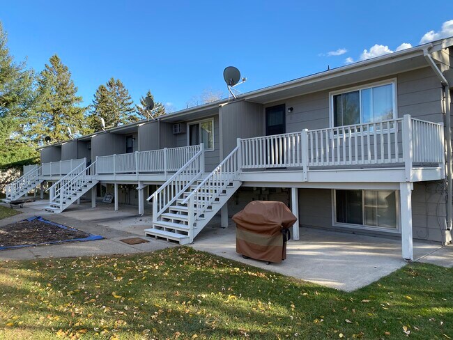 Concrete under deck which keeps it cleaner around the property - 3709 229th Ln NW