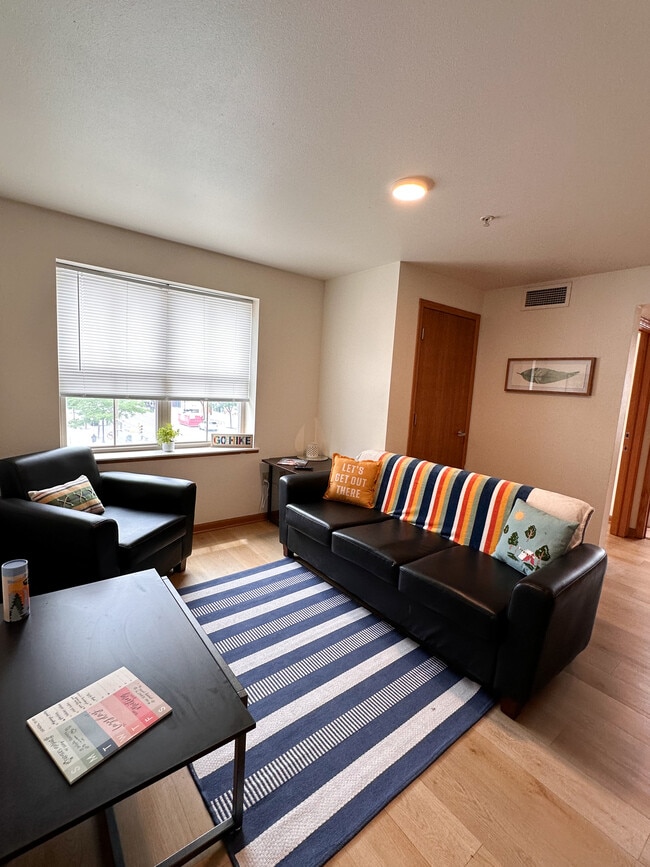 Living Room-Model Unit - Collegiate Campus Student Apartments